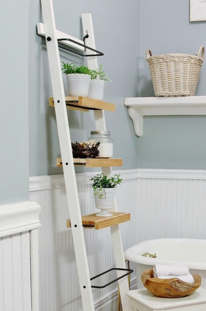 White ladder-style bathroom shelves