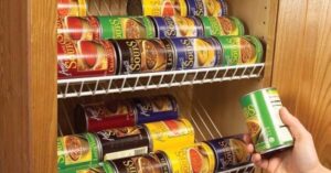 canned foods stored on a DIY closet shelf in a pantry