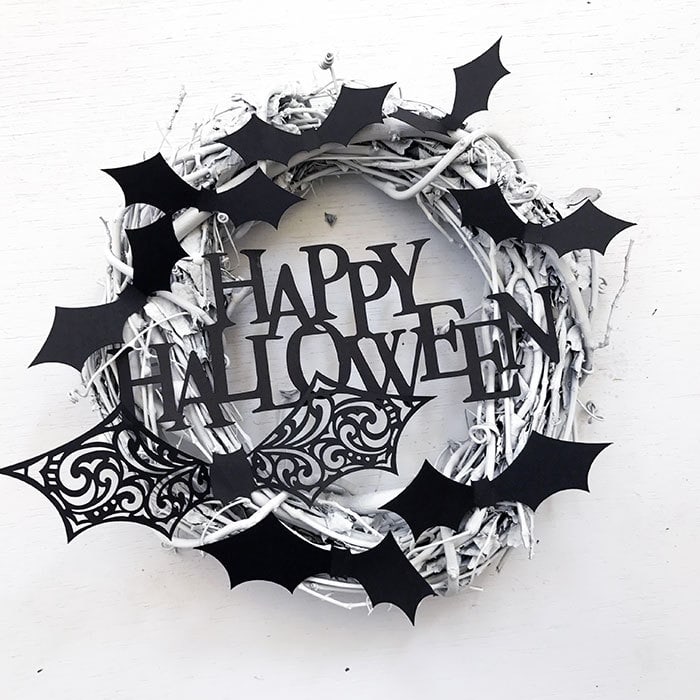 Black and White Cricut DIY Halloween wreath with bats