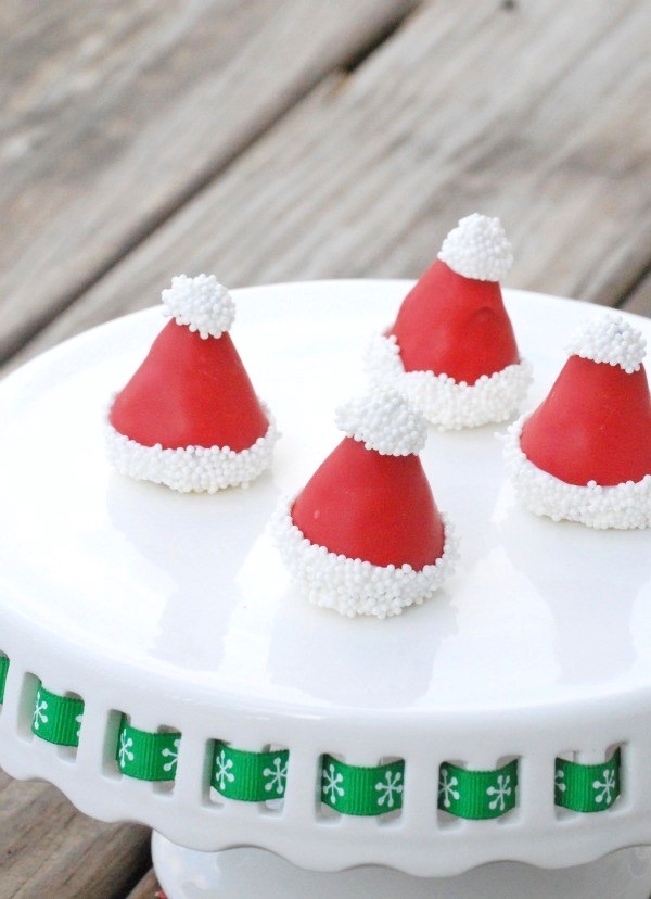 Santa hat Oreo cookie balls on a plate