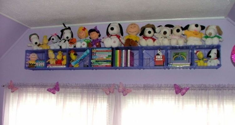 Baskets mounted on a wall for kids room organization