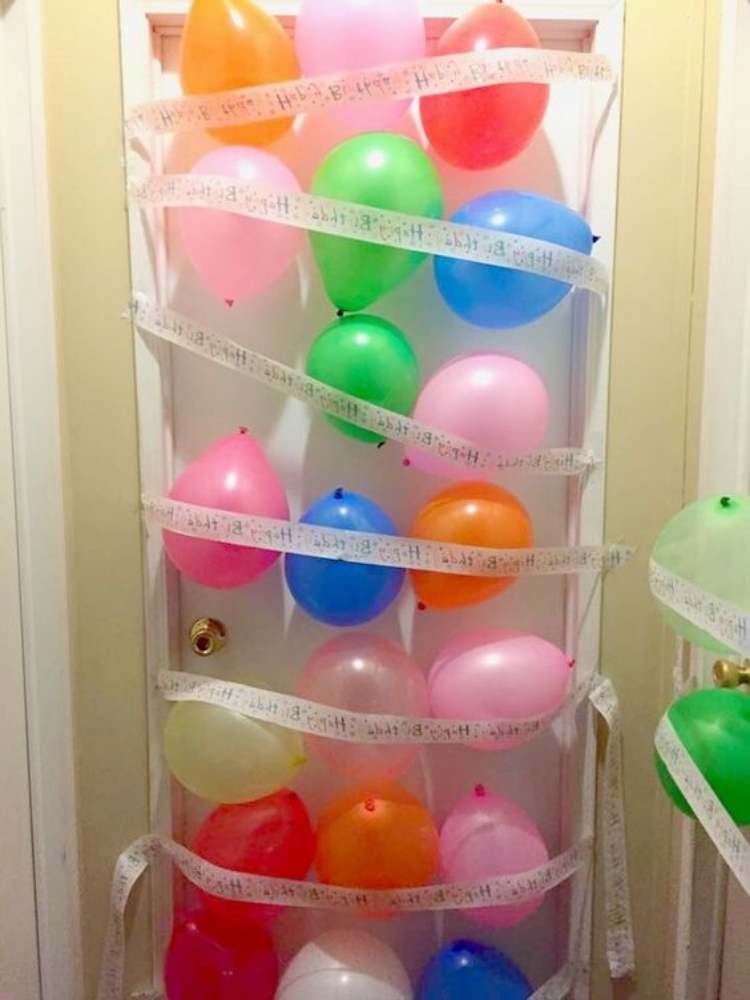 Birthday Prank Ideas- Picture of balloons taped on door for surprise