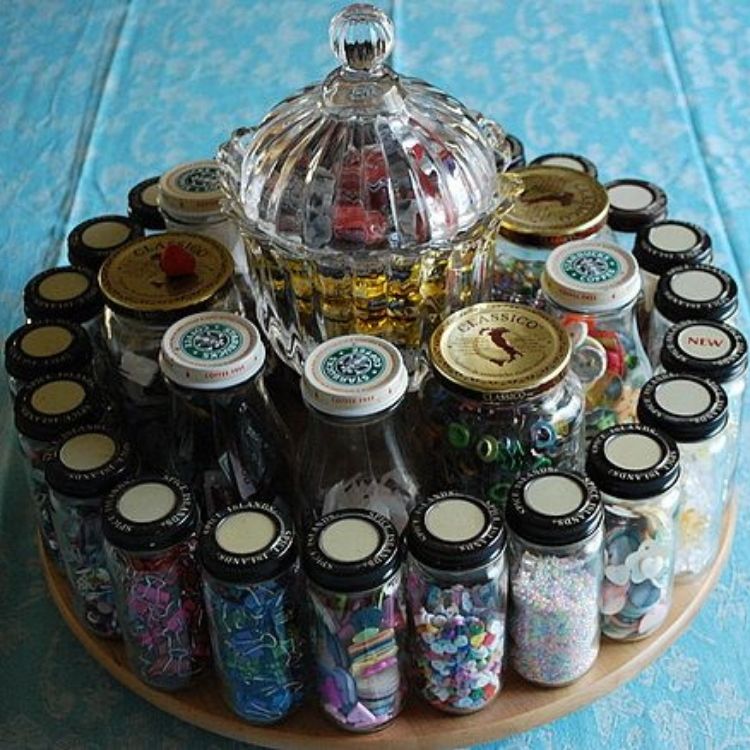 Lazy Susan stocked with multiple bottles containing small crafting materials