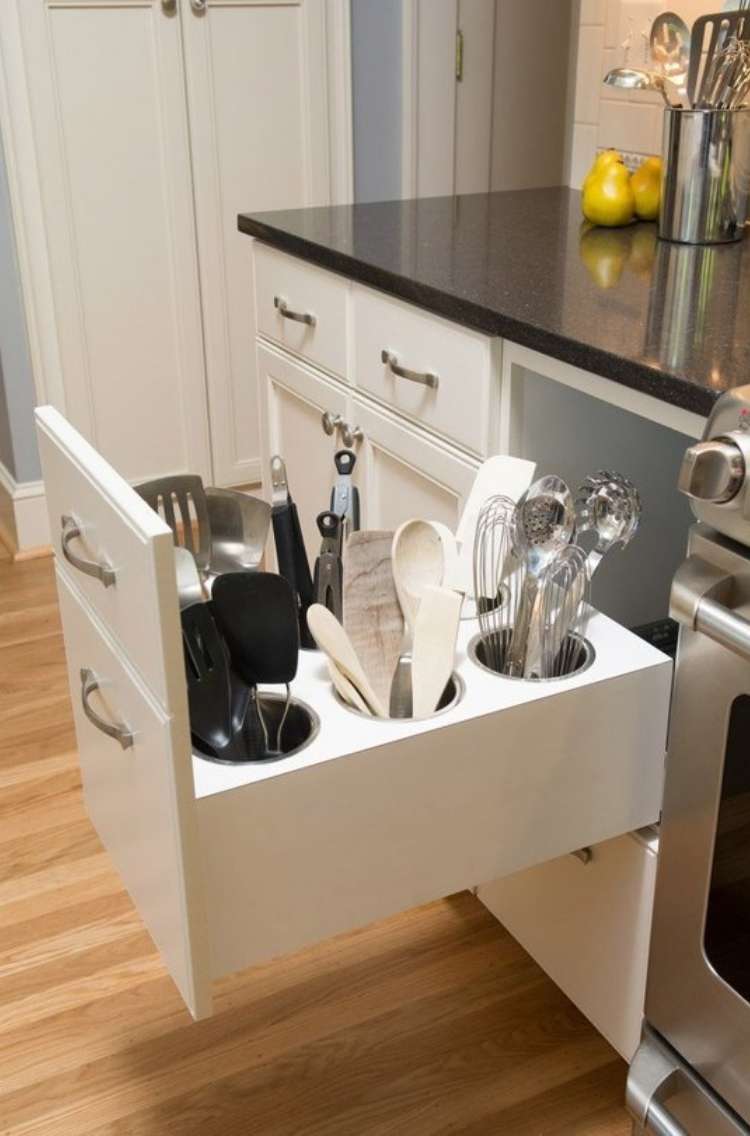 OneCrazyHouse How to Organize Kitchen Deep kitchen drawer next to stove, open, reavealing tall kitchen utensils neatly arranged standing up in drawer