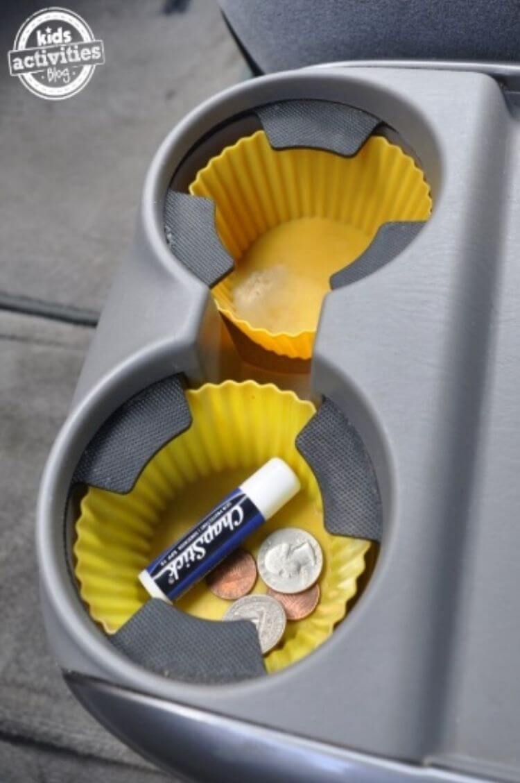 Silicone cupcake liners used to keep cup holders clean