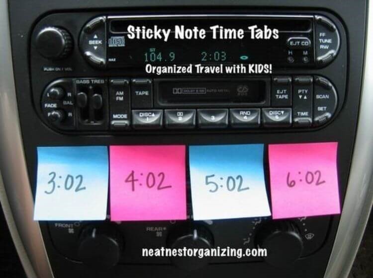 Car hack to keep kids behaving - sticky notes attached to a car dash with times written on them to reward kids