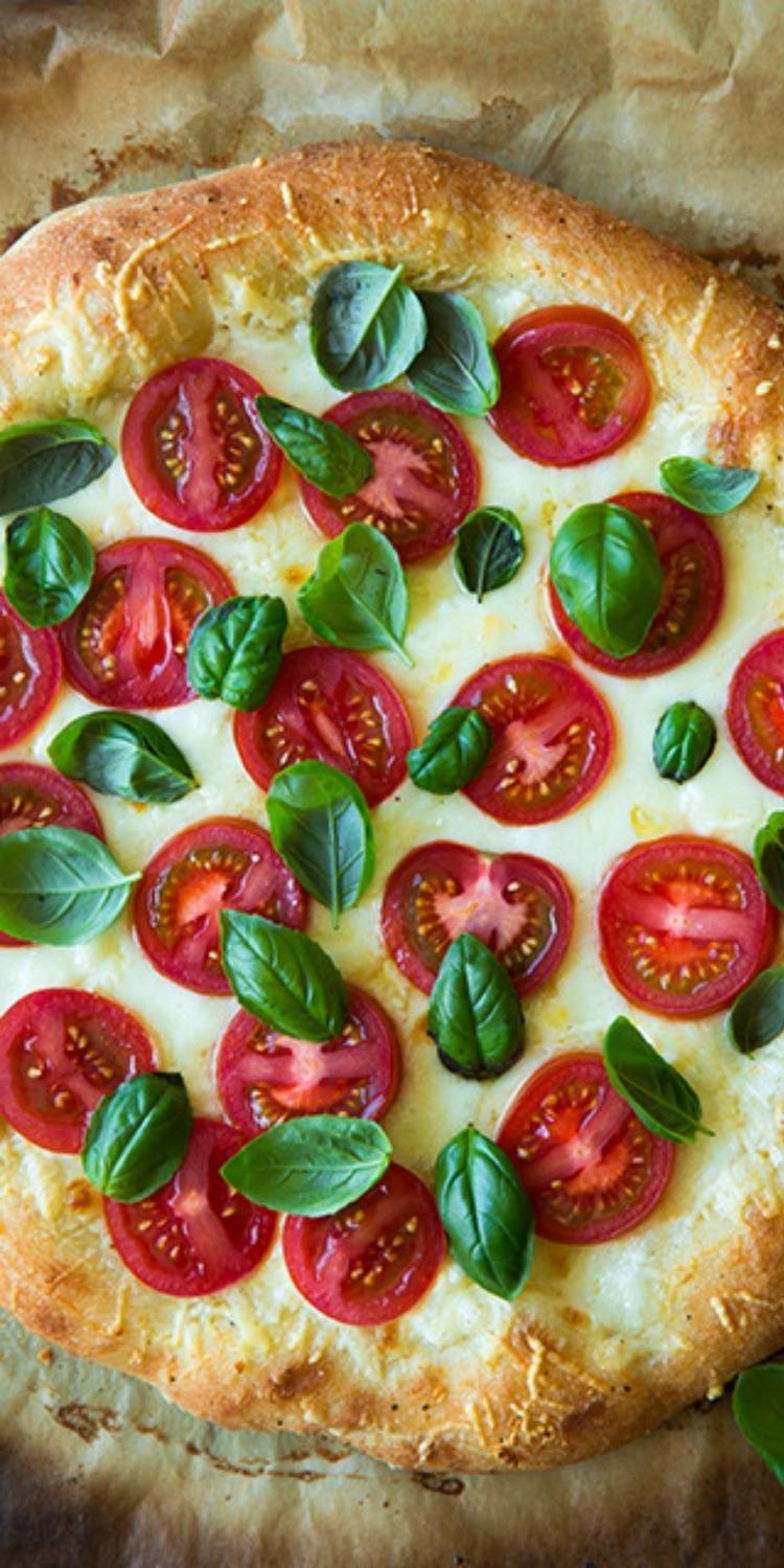 Insalata Caprese Pizza Toppings, tomato, basil and savory mozzarella cheese gourmet pizza.