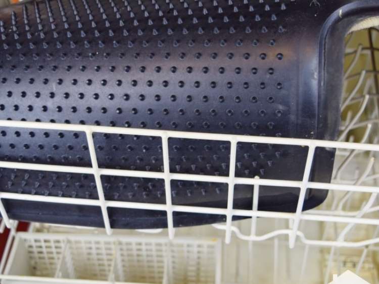 car floor mat in dishwasher rack
