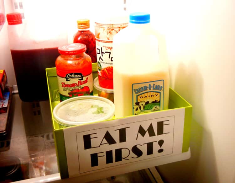 organize your fridge with a triage box for food that needs to be consumed as soon as possible
