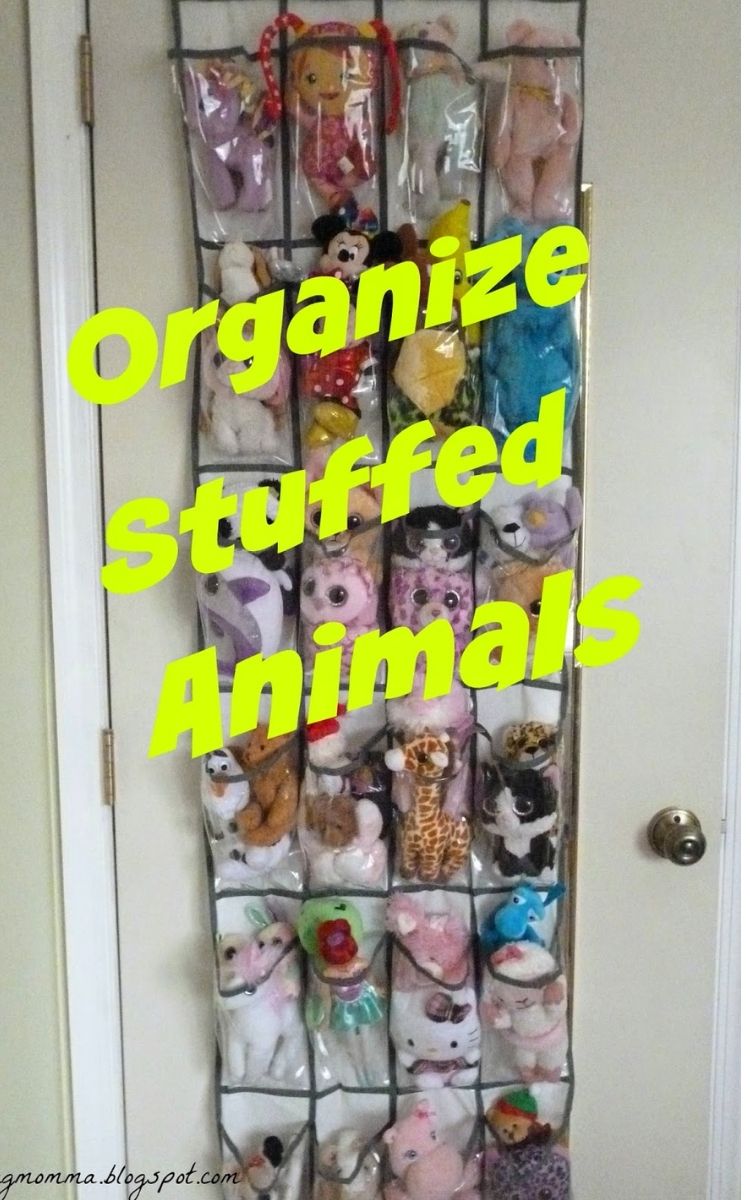 stuffed animals stored in shoe organizer