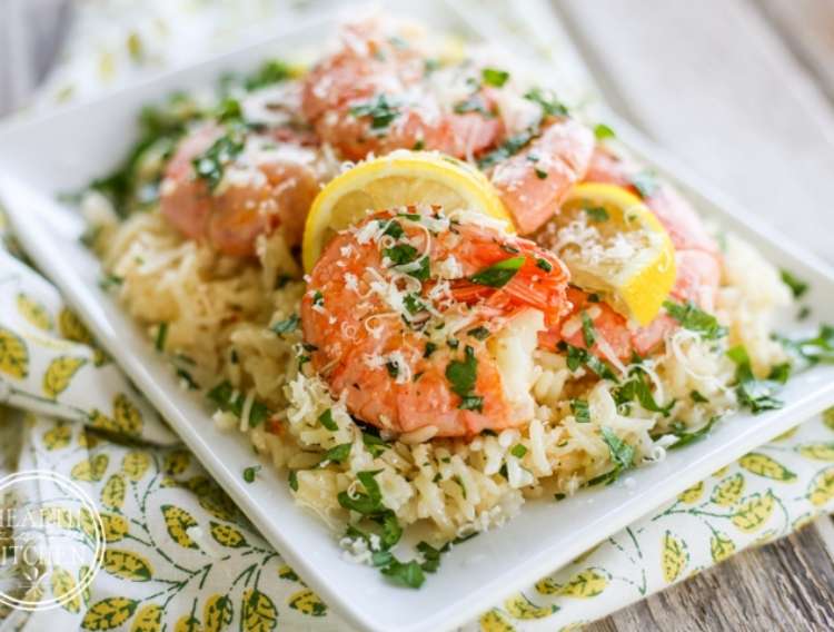 One Crazy House Instant Pot Dinners plate of rice covered in garnished scampi shrimp