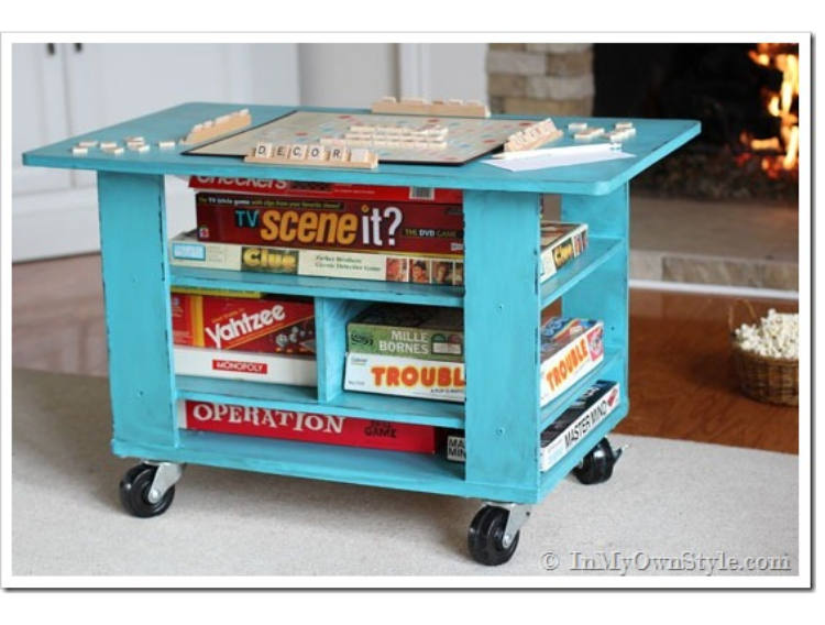 Turn your old coffee table into a rolling storage cart that holds board games and also allows you to use the top to play games