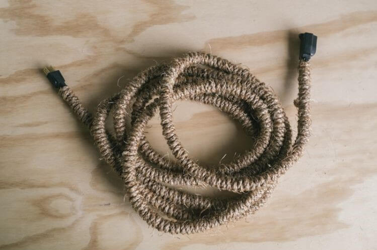 Jute twine wrapped around a power cord for better cable management
