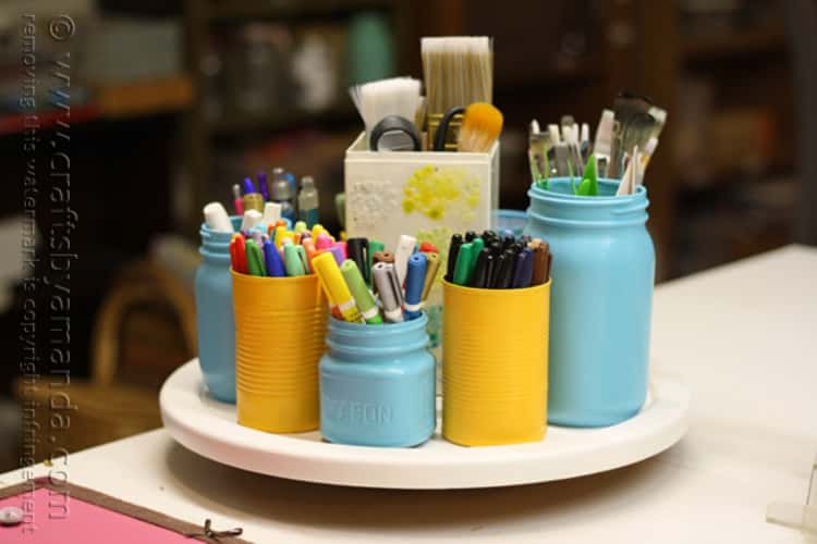 DIY crafts room organizer using mason jars and cans and adding them on to a Lazy Susan