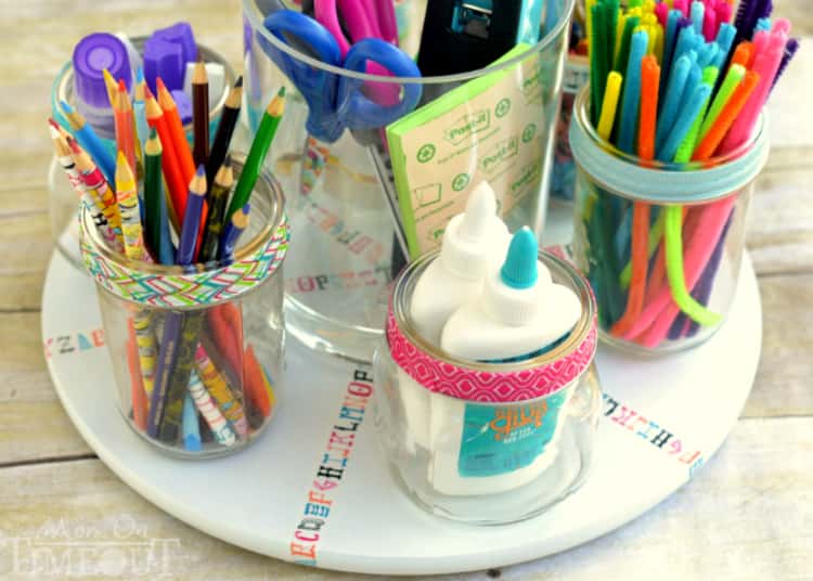 Homework and crafting supplies organized with a DIY Lazy Susan Homework Station
