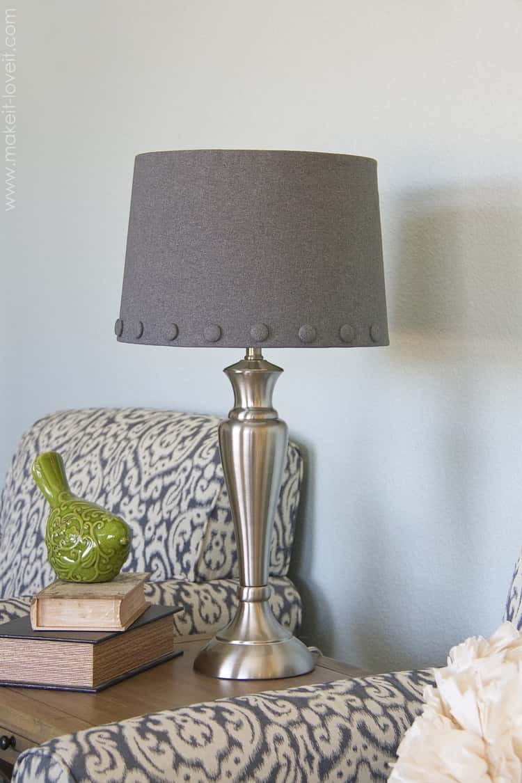 Dress the lamp-shade in new fabric
