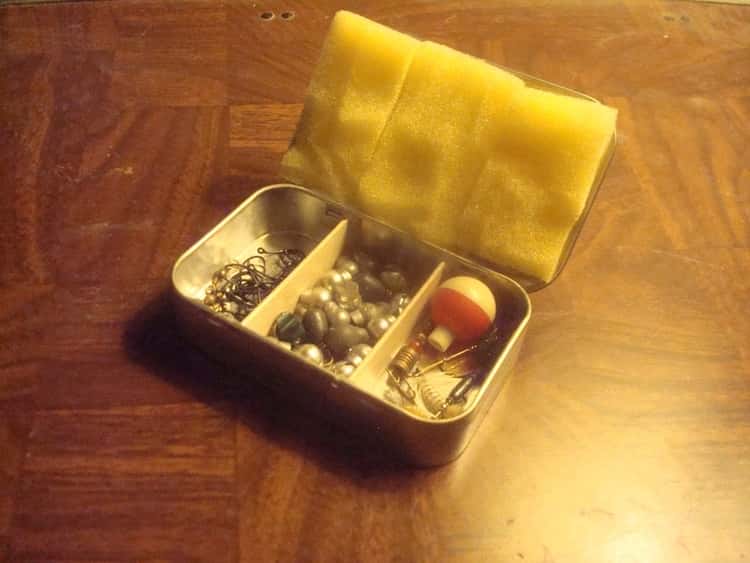 mini tackle box with popsicle sticks as dividers made from an empty altoid tin.