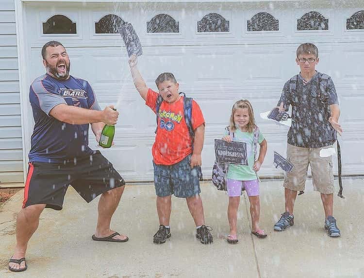 back to school photo ideas - Dad pops the bubbly while kids look on in disbelief 