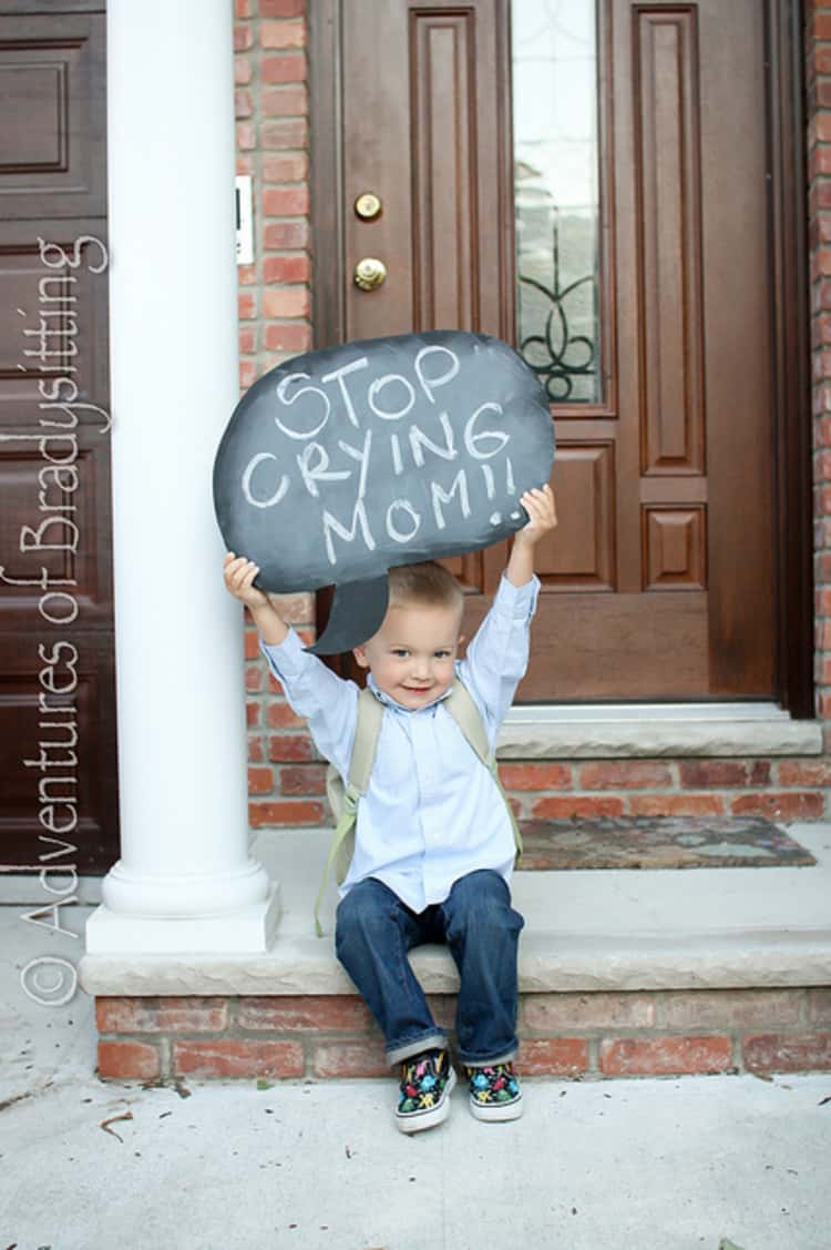 back to school photo ideas - Preschooler holding a sign that says "stop crying mom"