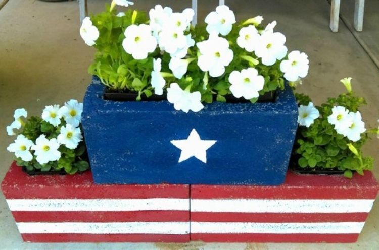 These colorful red, white, and blue painted cinder blocks are a festive way to reuse your blocks for the holidays. 