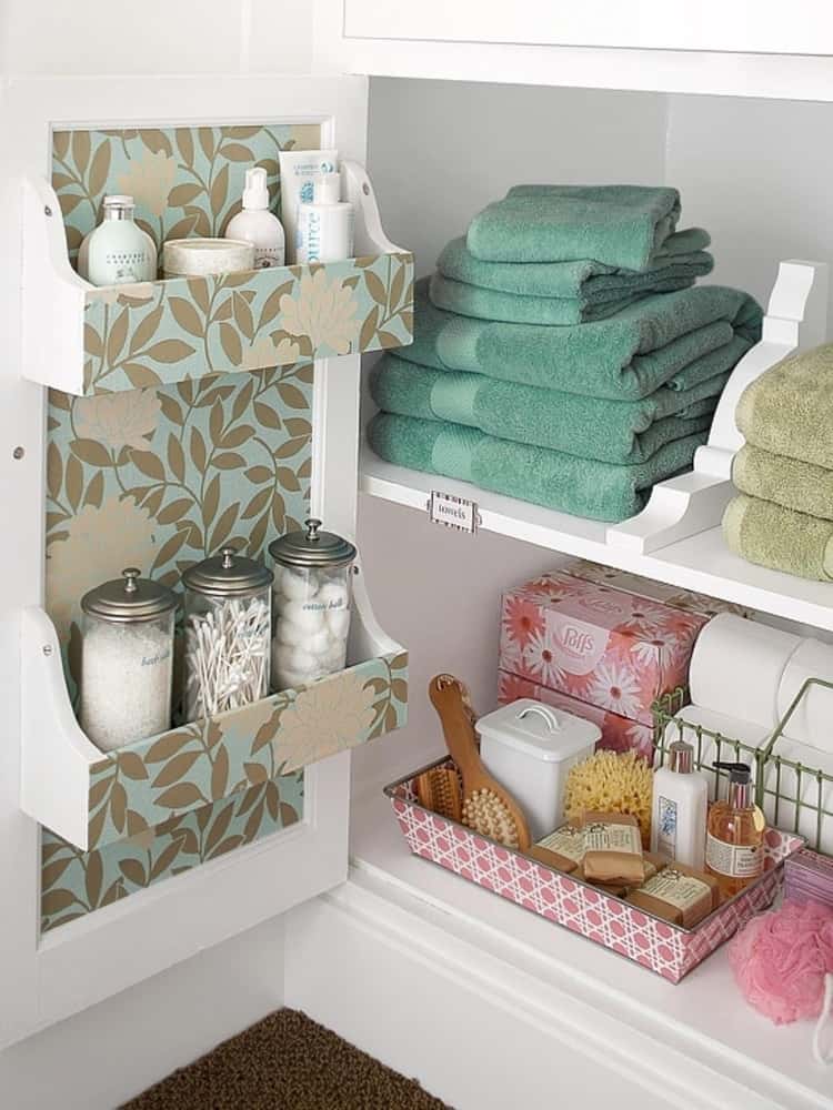 Storage shelves inside bathroom cabinet door to save space and hold shampoo, lotion, cotton balls in a jar, etc.