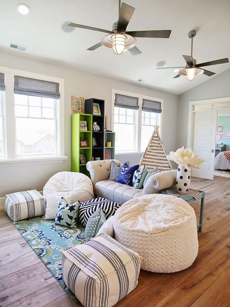 OneCrazyHouse kid friendly living room ideas living room with a soft couch surrounded by bean bag chairs that match living room decorations