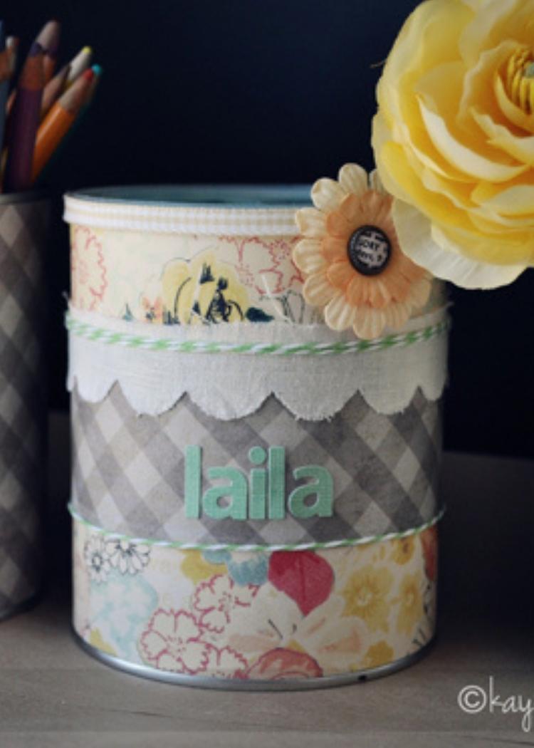 Decorated formula canister as a piggy bank personalized with name, lace and flowers. 