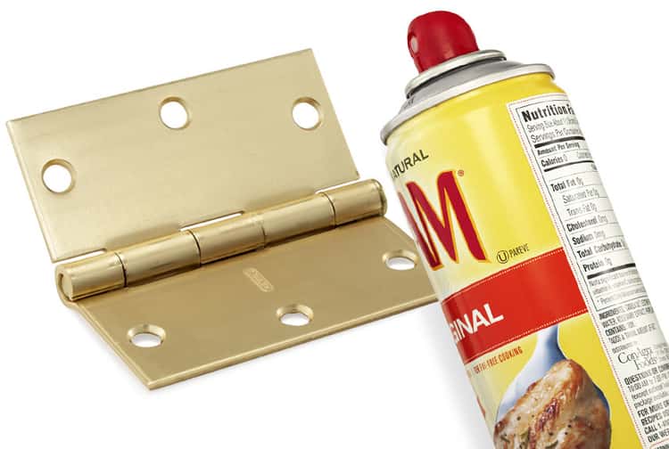 A door hinge and a can of cooking spray 