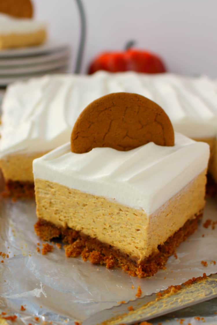 Photo of No-bake pumpkin dessert cheesecake bars.