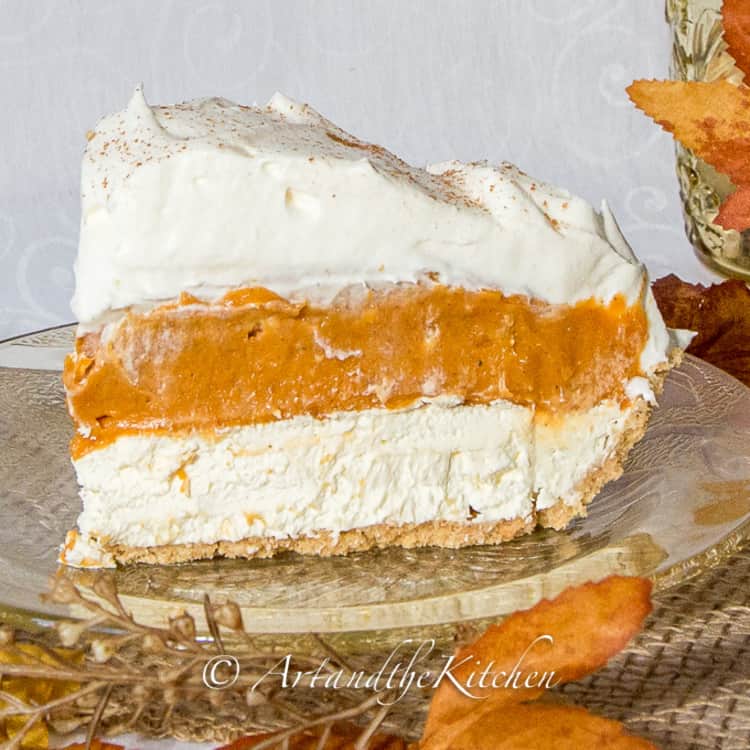 No bake triple layer pumpkin pie dessert recipe on a glass plate.