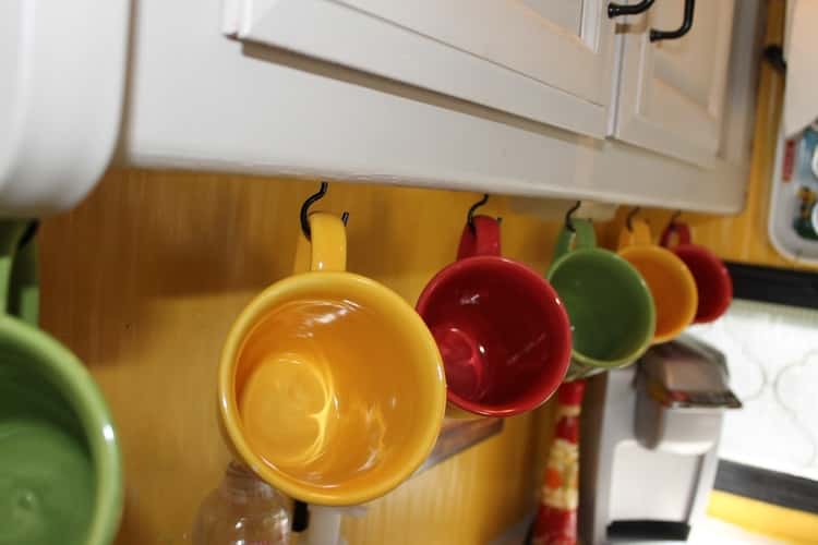 hang your coffee mugs in the RV to save cabinet space
