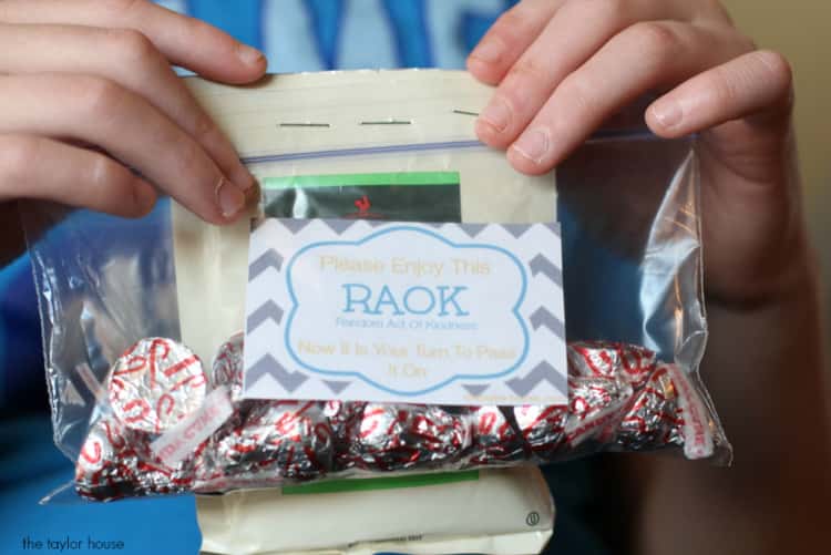 A photo of sweets in a bag with a 'Random Acts Of Kindness' Sticker
